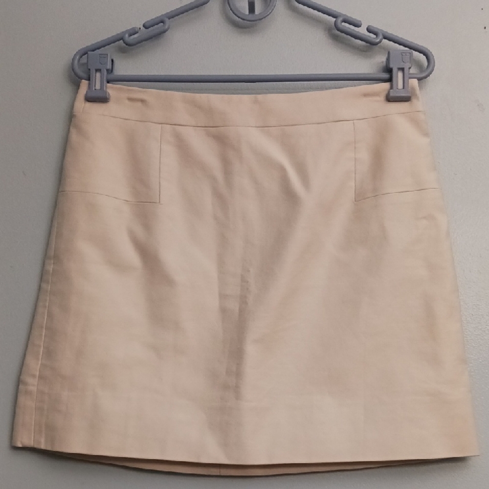 J. Crew size 10 women's cream office/business stretch mini skirt .